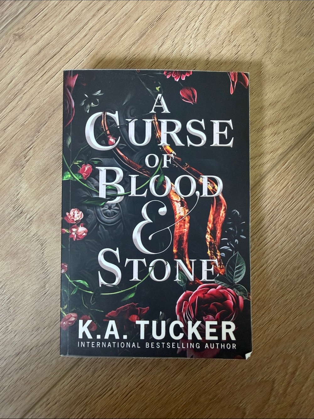 A Curse of Blood & Stone by K.A. Tucker - Dark Floral Paperback